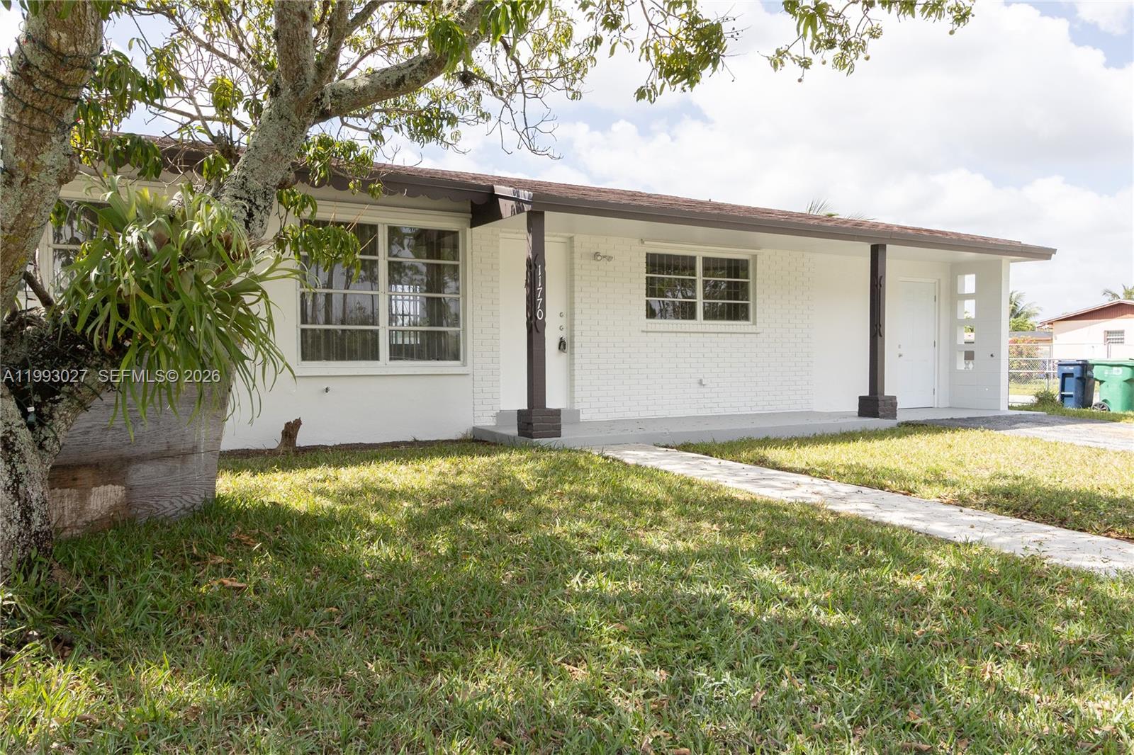 11770 Southwest 168th Street, Unit 11770 Miami, FL 33177 - Photo 22 of 22 a view of house with yard