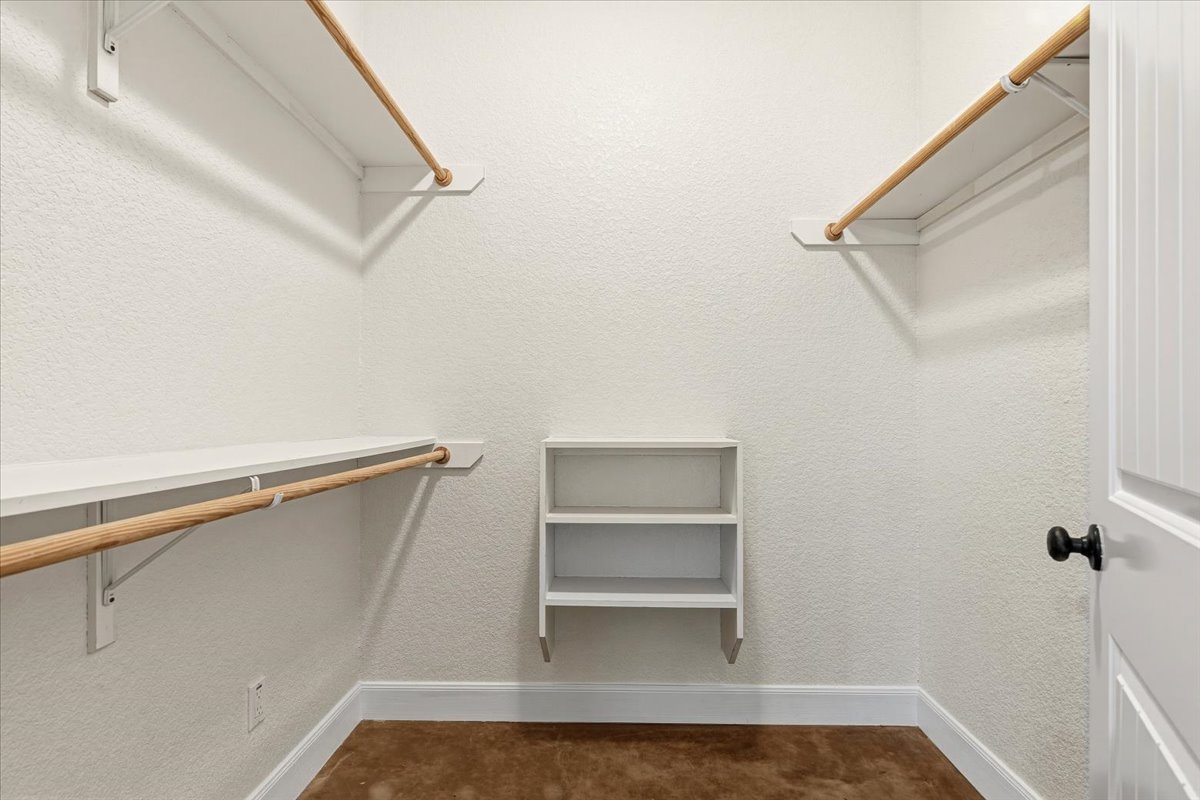 207 Cardinal Loop Paige, TX 78659 - Photo 15 of 39 a view of an empty walk in closet