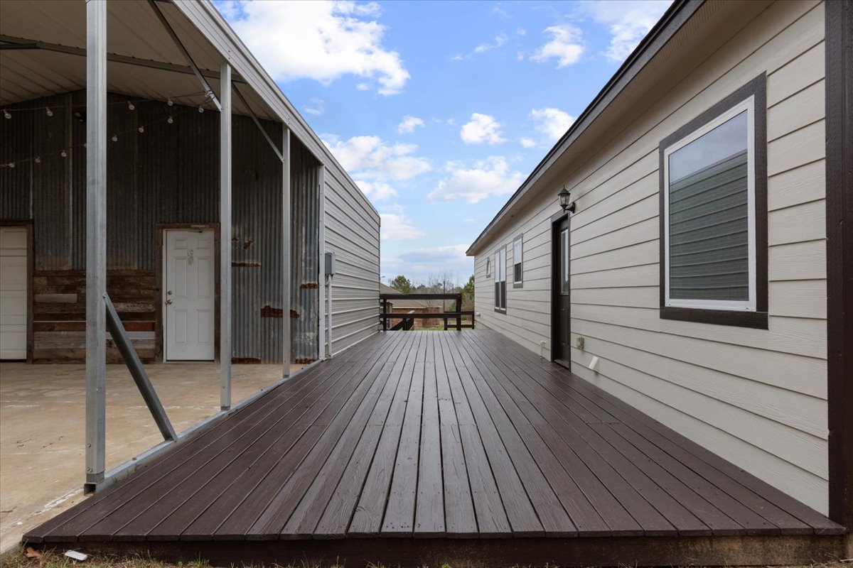 207 Cardinal Loop Paige, TX 78659 - Photo 31 of 39 Deck with a patio area