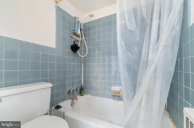 a kitchen with stainless steel appliances granite countertop a sink and a stove