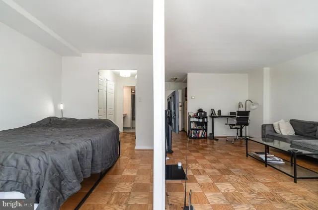 a bathroom with a toilet and bathtub