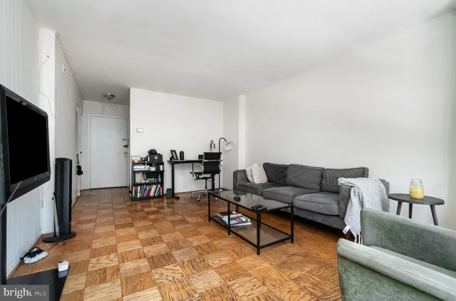 a kitchen with stainless steel appliances granite countertop a sink a stove and cabinets