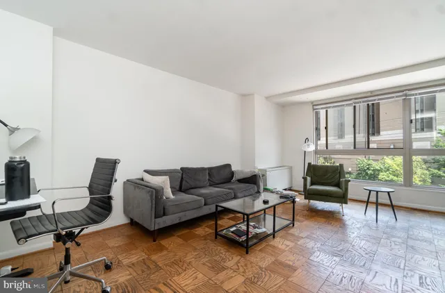 a view of a bathroom from a hallway