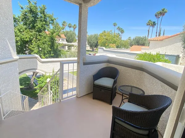 a view of balcony with patio