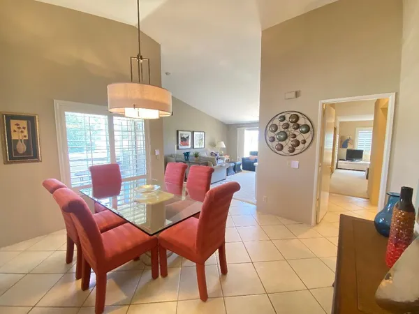 a view of a dining room with furniture
