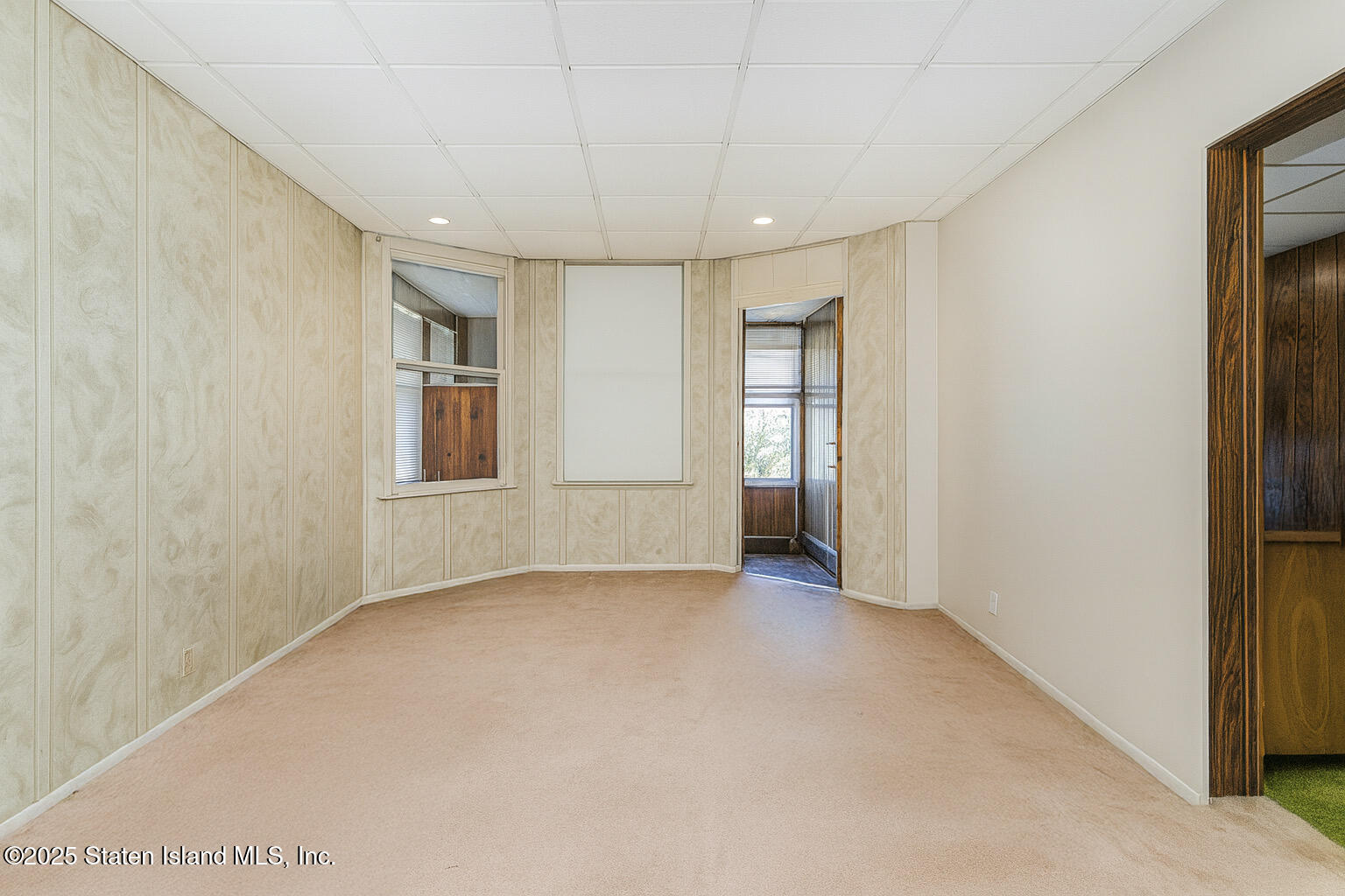 230 Fillmore Street Staten Island, NY 10301 - Photo 13 of 37 an empty room with windows and closet