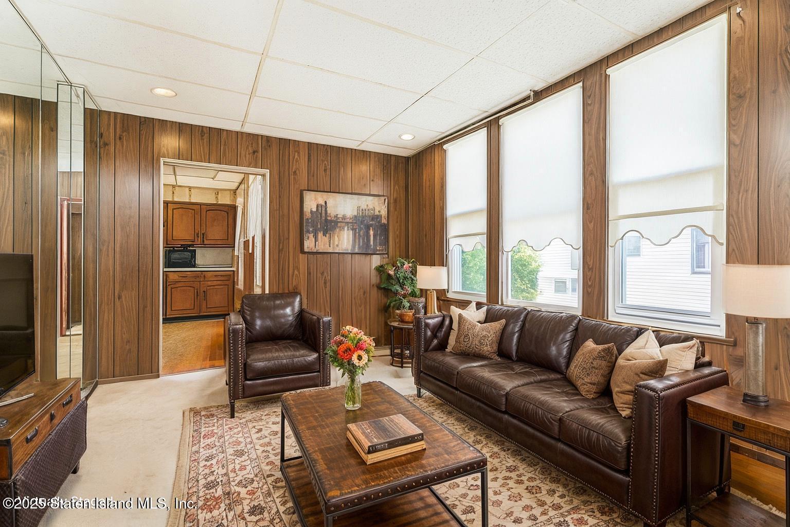 230 Fillmore Street Staten Island, NY 10301 - Photo 25 of 37 a living room with furniture and a large window