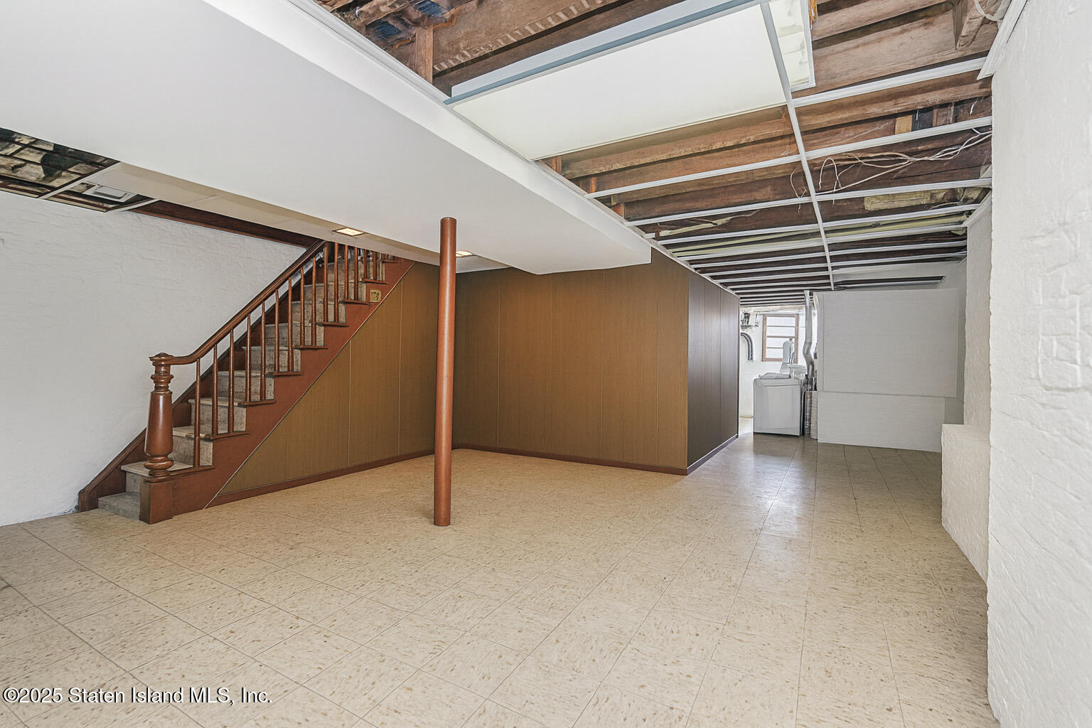 230 Fillmore Street Staten Island, NY 10301 - Photo 27 of 37 a view of an empty room with stairs