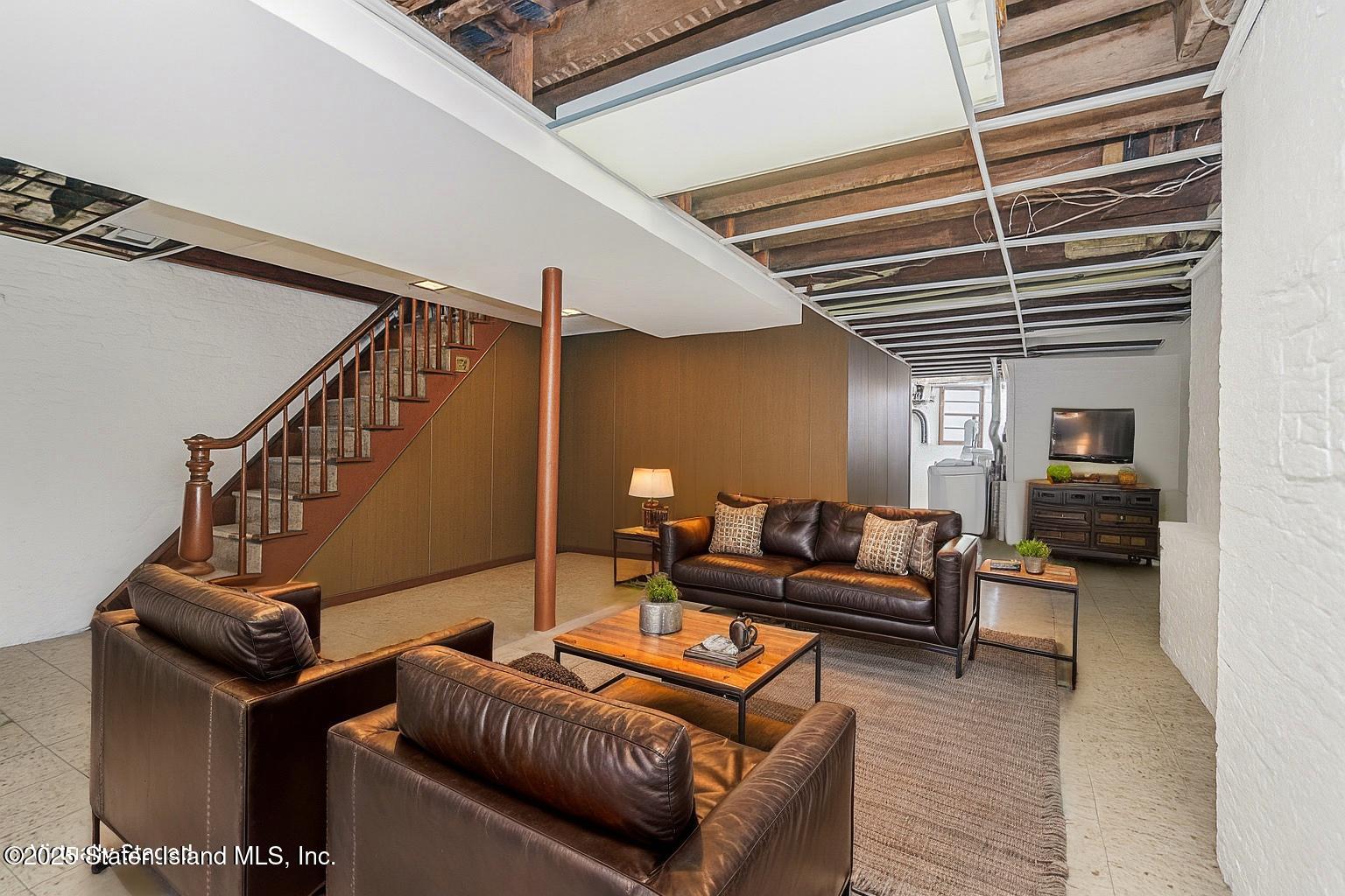 230 Fillmore Street Staten Island, NY 10301 - Photo 28 of 37 a living room with furniture and wooden floor