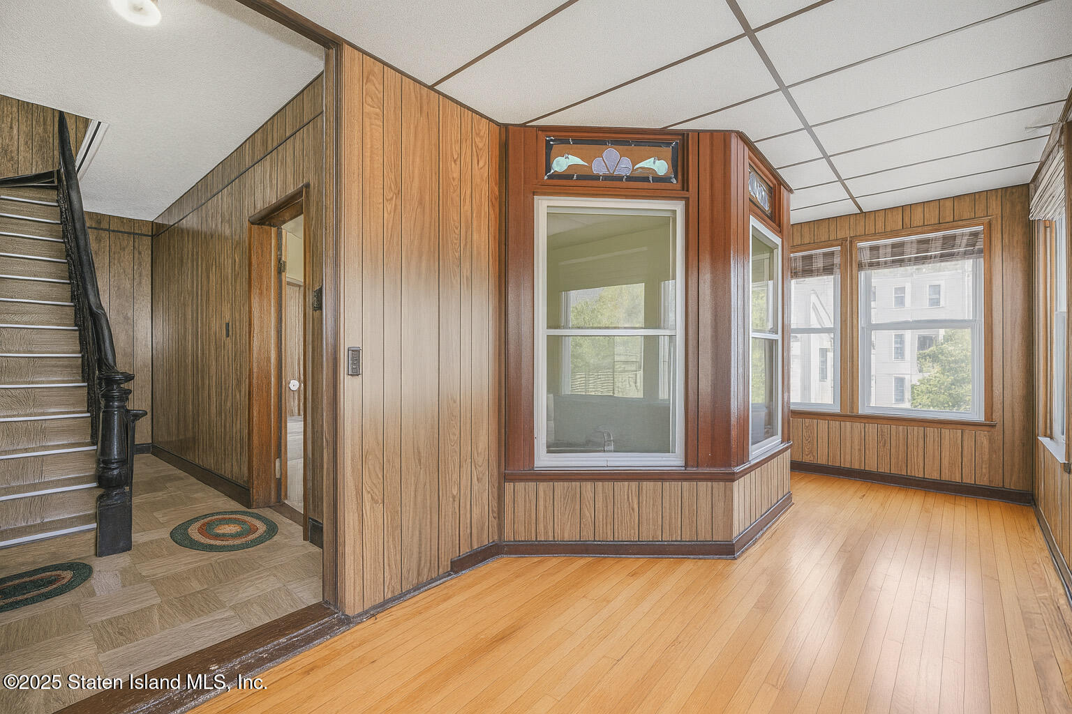 230 Fillmore Street Staten Island, NY 10301 - Photo 3 of 37 a view of an empty room with glass door
