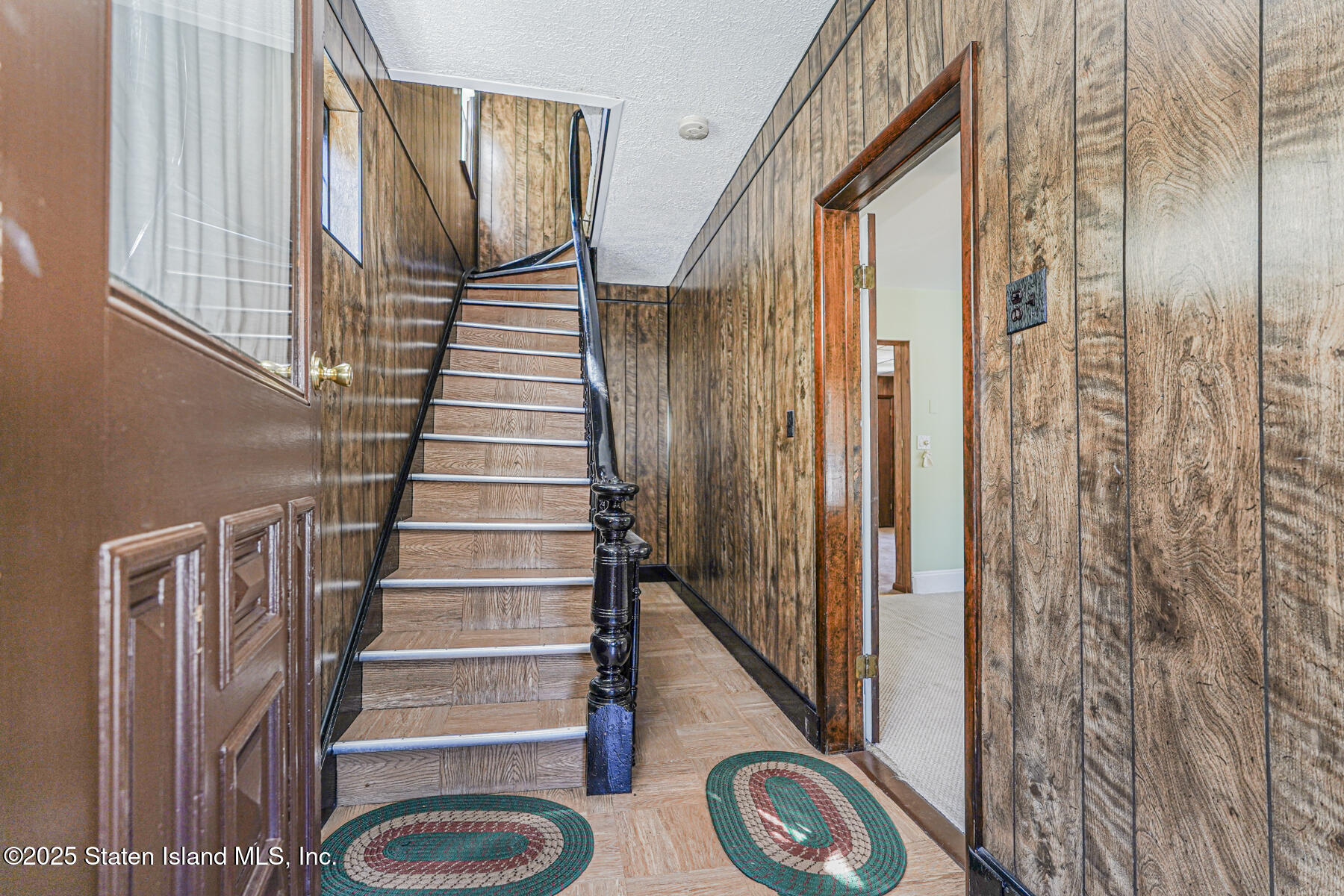 230 Fillmore Street Staten Island, NY 10301 - Photo 4 of 37 a view of entryway with wooden floor and window