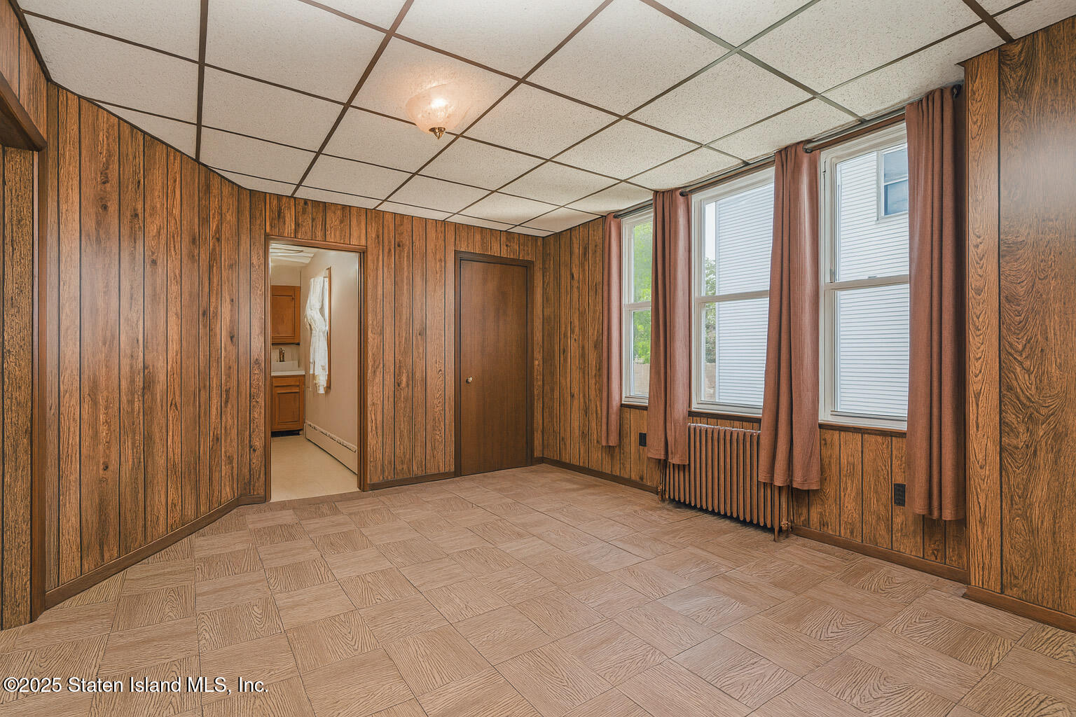 230 Fillmore Street Staten Island, NY 10301 - Photo 7 of 37 a view of an empty room with a window