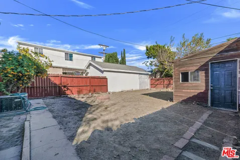 a view of a house with a street