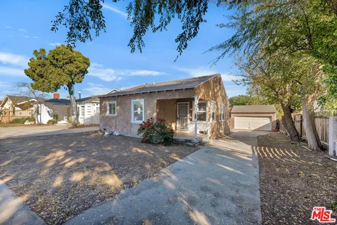 a view of a house with a patio