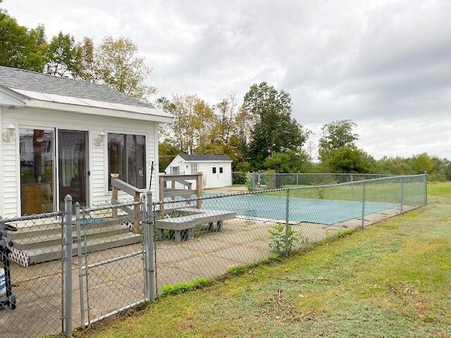 273 South Reynolds Road Winslow, ME 04901 - Photo 33 of 40 Sunroom & pool area