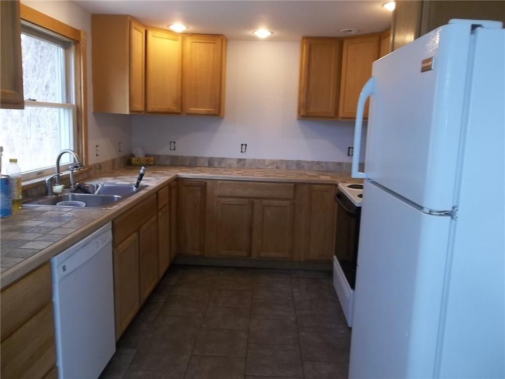 596 Patricktown Road Somerville, ME 04348 - Photo 3 of 12 Kitchen stove, refrigerator and...
