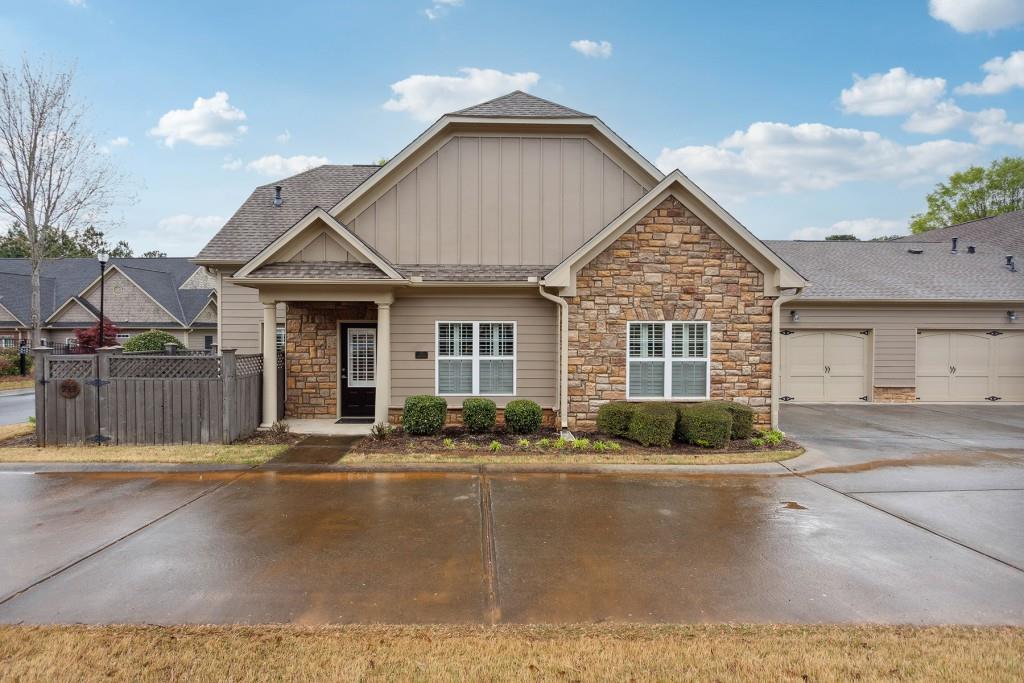 213 Glens Loop Woodstock, GA 30188 - Photo 1 of 1 a front view of a house with a yard