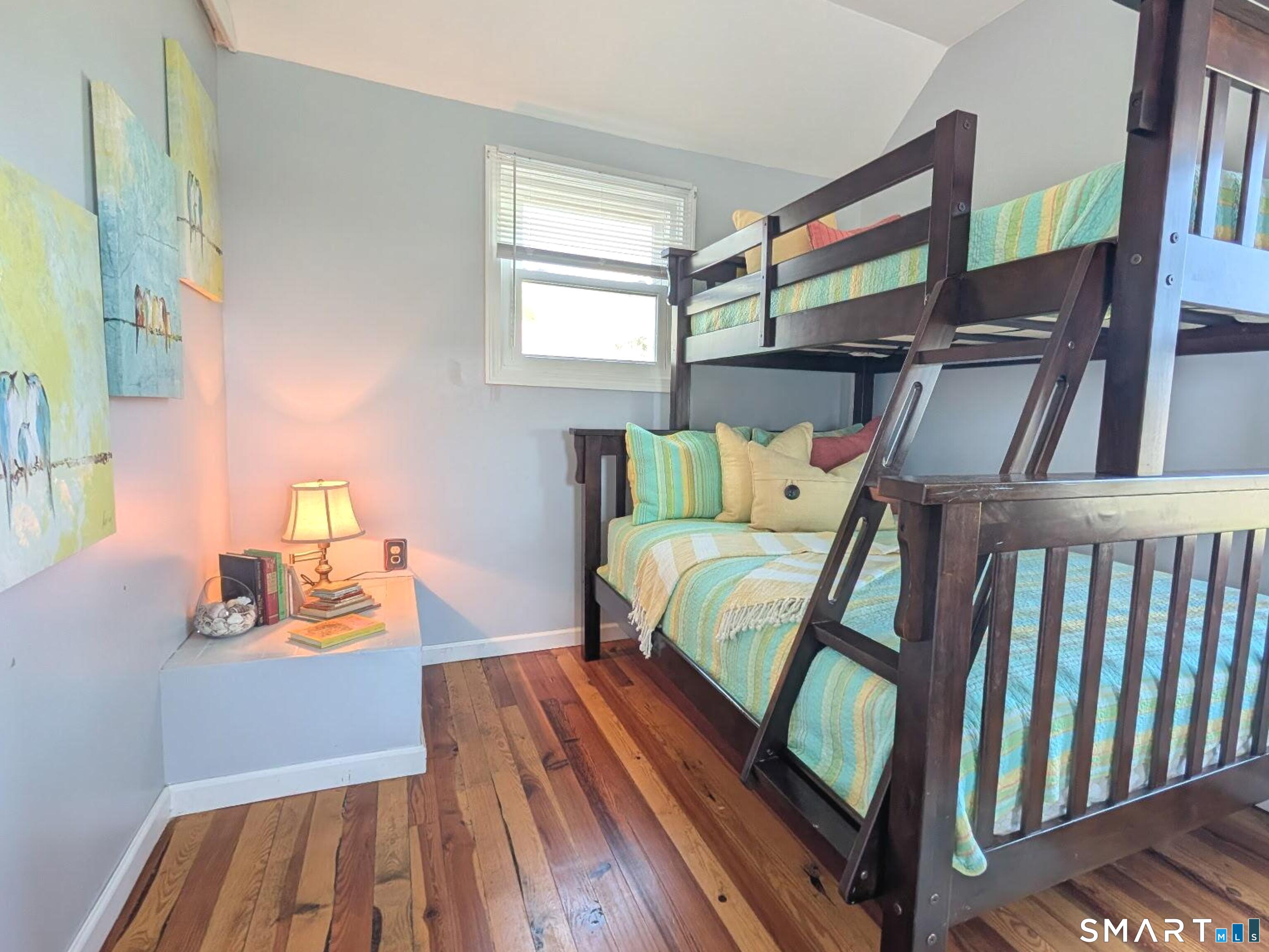 31 Old Colony Road Old Lyme, CT 06371 - Photo 20 of 38 a bedroom with furniture and a window