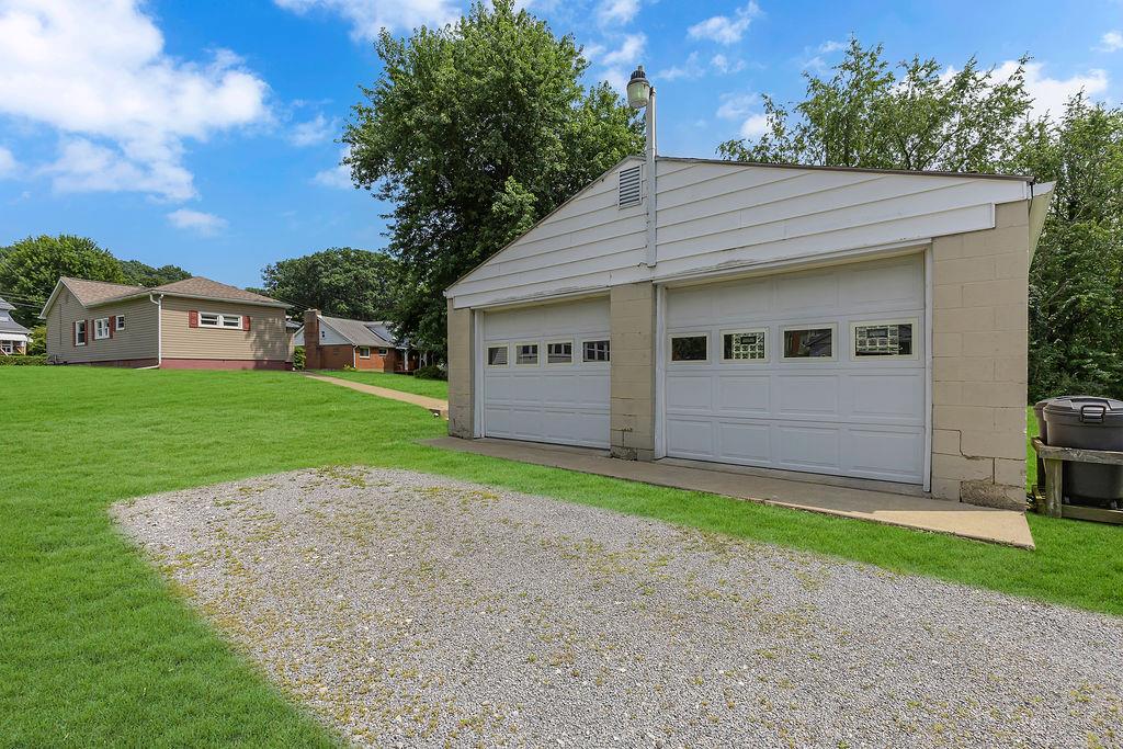 4706 Rochester Road New Brighton, PA 15066 - Photo 26 of 28 2 stall detached garage has automatic door openers/keyless entry and dusk/dawn light.
