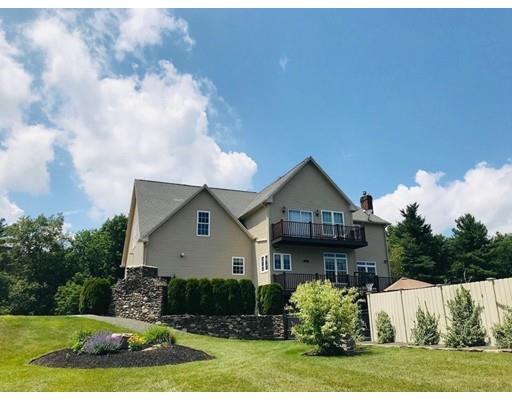 237 Pleasantdale Road Rutland, MA 01543 - Photo 23 of 42 a front view of a house with garden