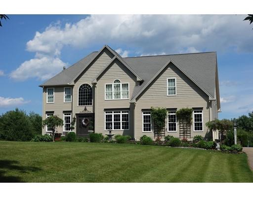237 Pleasantdale Road Rutland, MA 01543 - Photo 3 of 42 a front view of a house with a yard