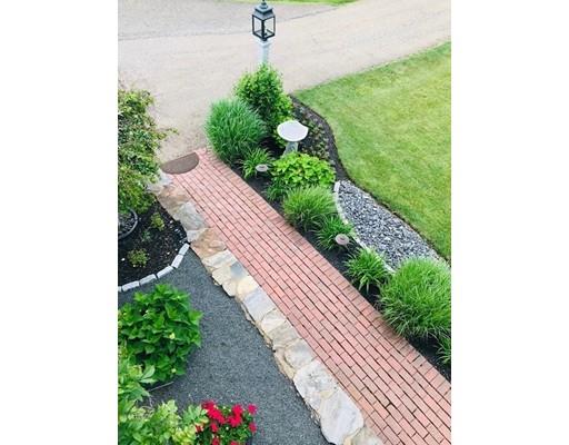 237 Pleasantdale Road Rutland, MA 01543 - Photo 4 of 42 a view of a garden with pathway