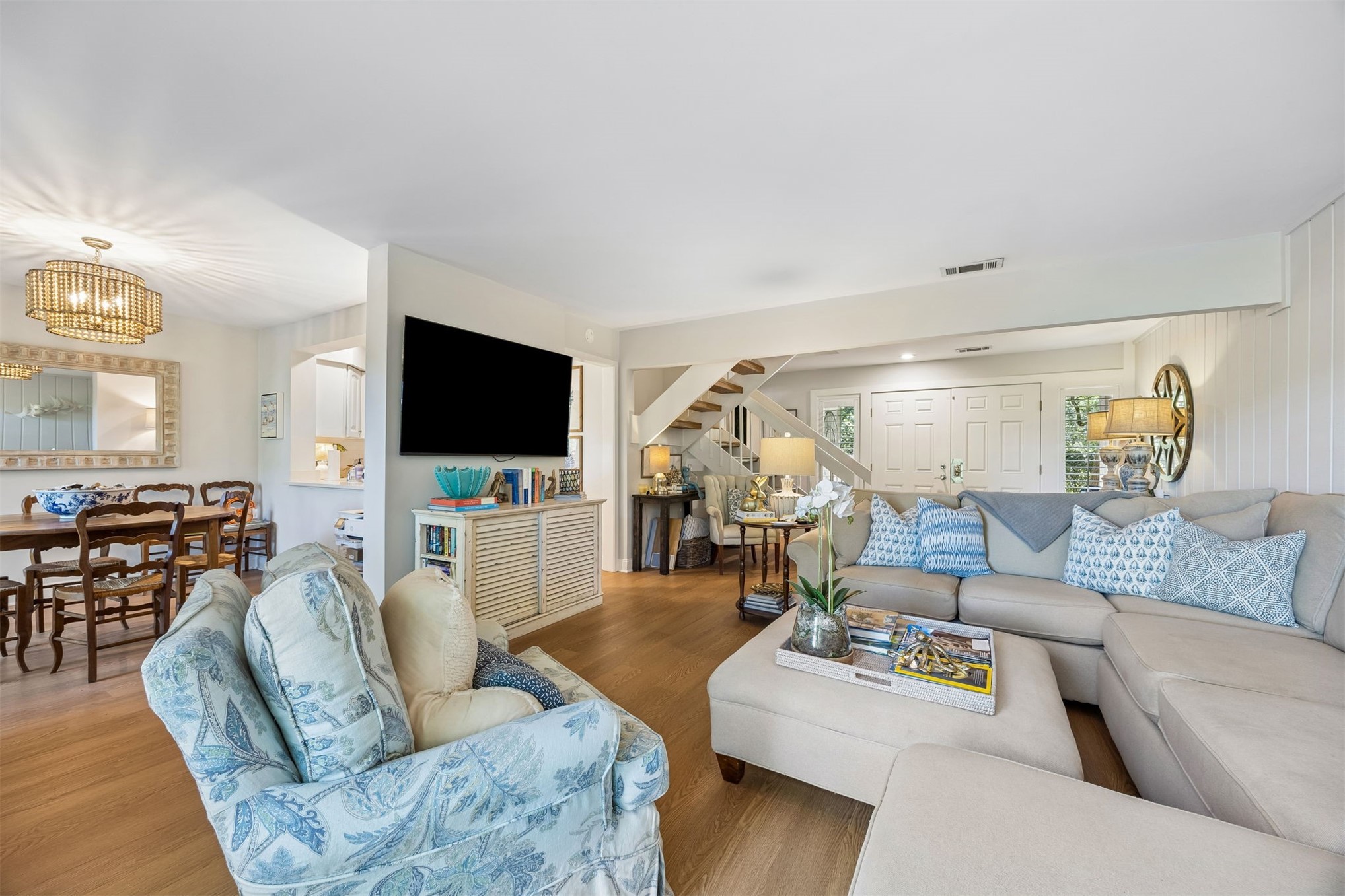 2005 Beachwood Road, Unit 2005 Amelia Island, FL 32034 - Photo 6 of 43 a living room with furniture and a flat screen tv