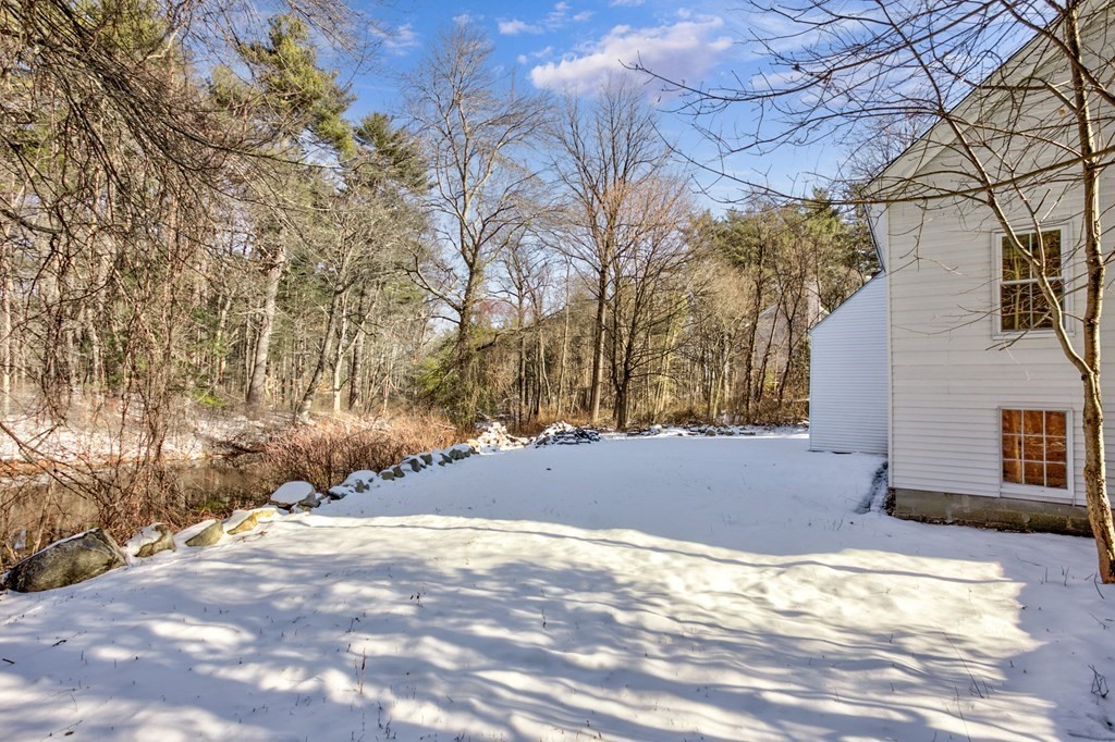 4 Highland Street Townsend, MA 01469 - Photo 11 of 14 a view of a yard with a tree
