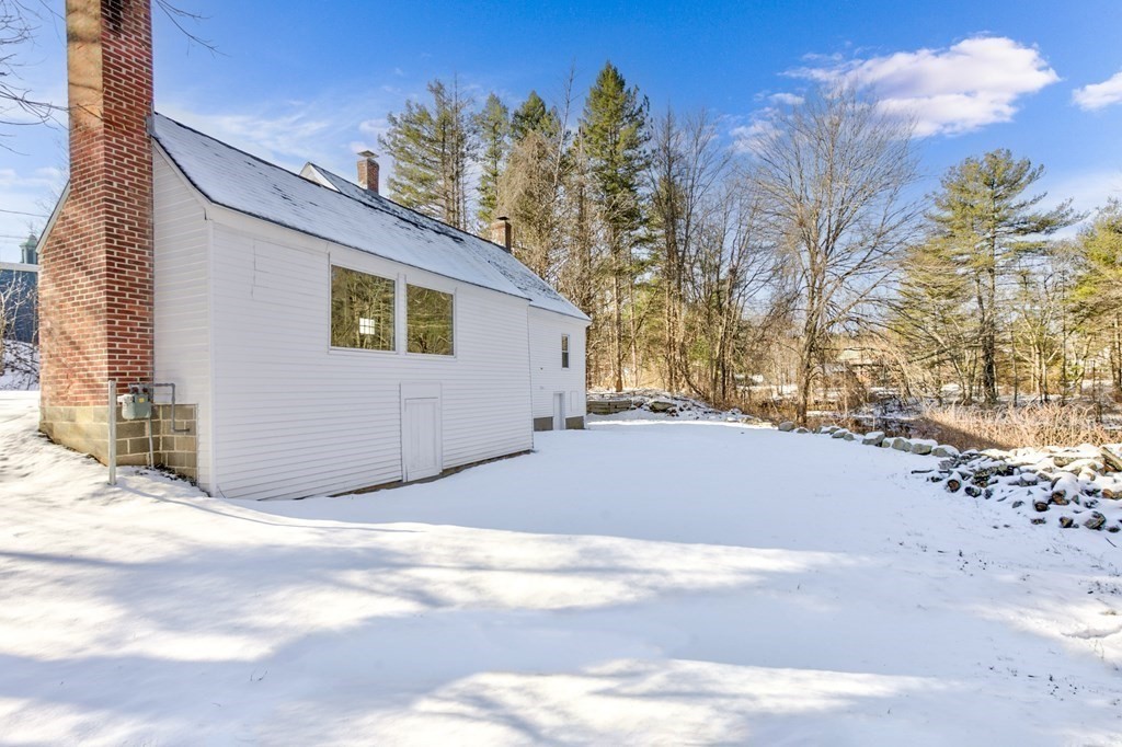 4 Highland Street Townsend, MA 01469 - Photo 12 of 14 a view of backyard of the house
