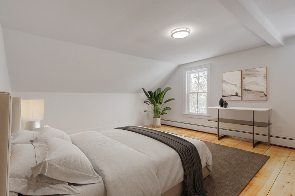 4 Highland Street Townsend, MA 01469 - Photo 9 of 14 a bedroom with a bed and window