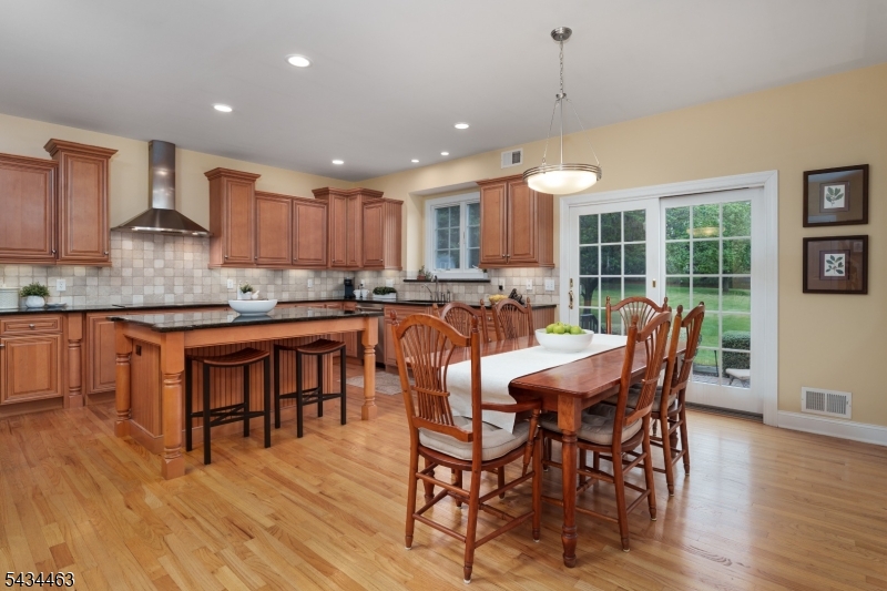 110 Orchard Road Skillman, NJ 08558 - Photo 13 of 43 a dining room filled chandelier and wooden floor