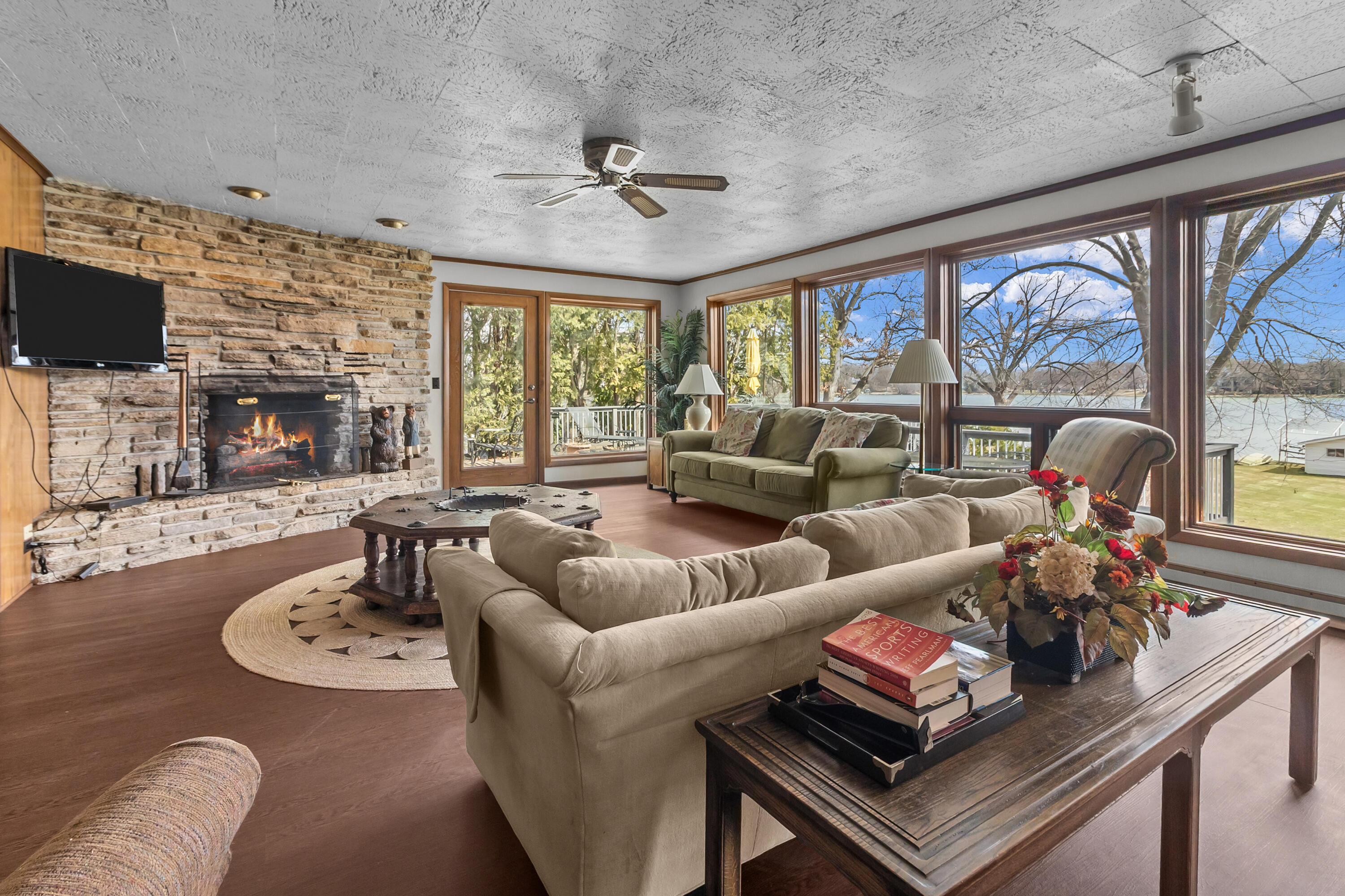 N1140 Tombeau Road Bloomfield, WI 53128 - Photo 14 of 46 Living room with fireplace