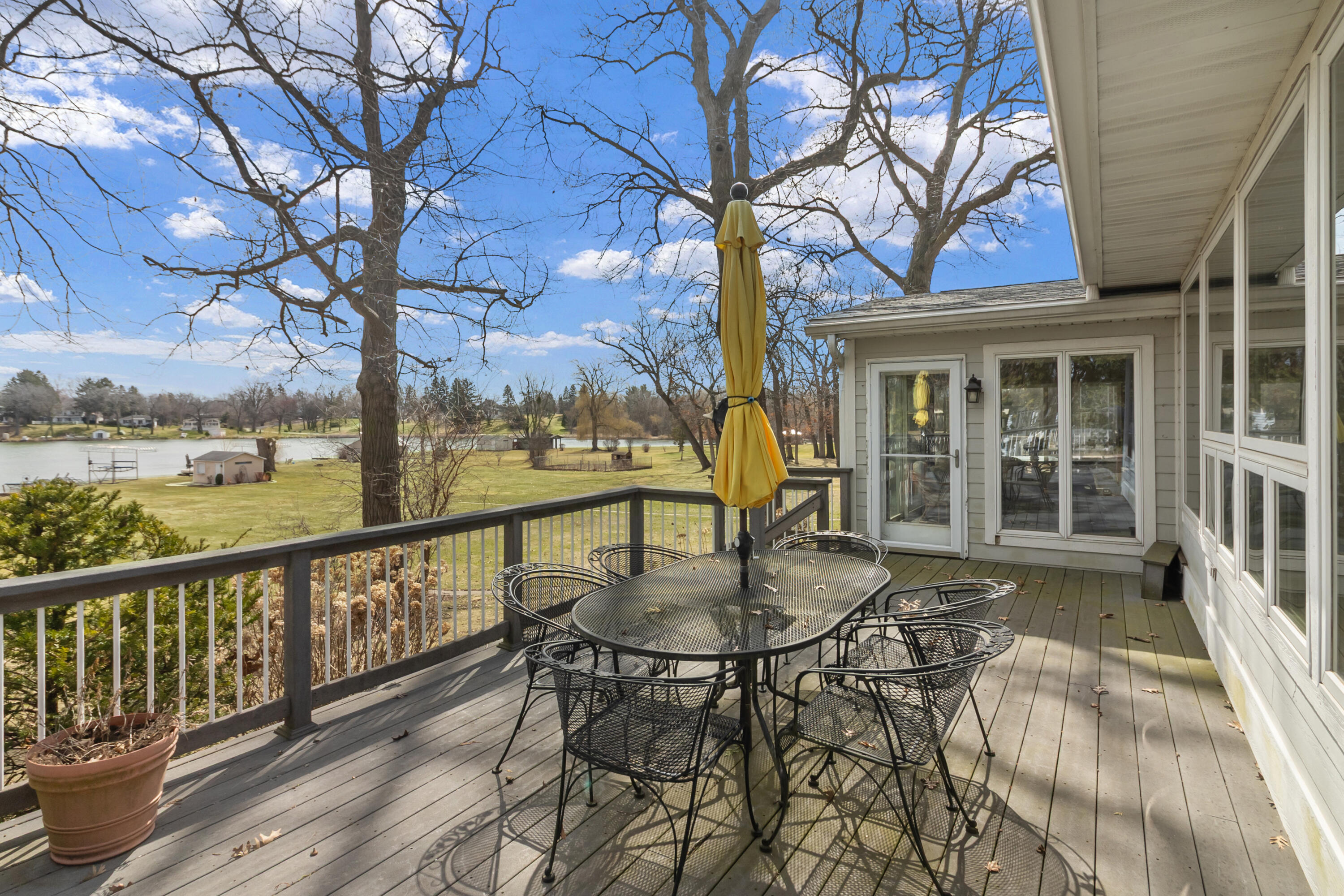 N1140 Tombeau Road Bloomfield, WI 53128 - Photo 8 of 46 Deck off Sunroom