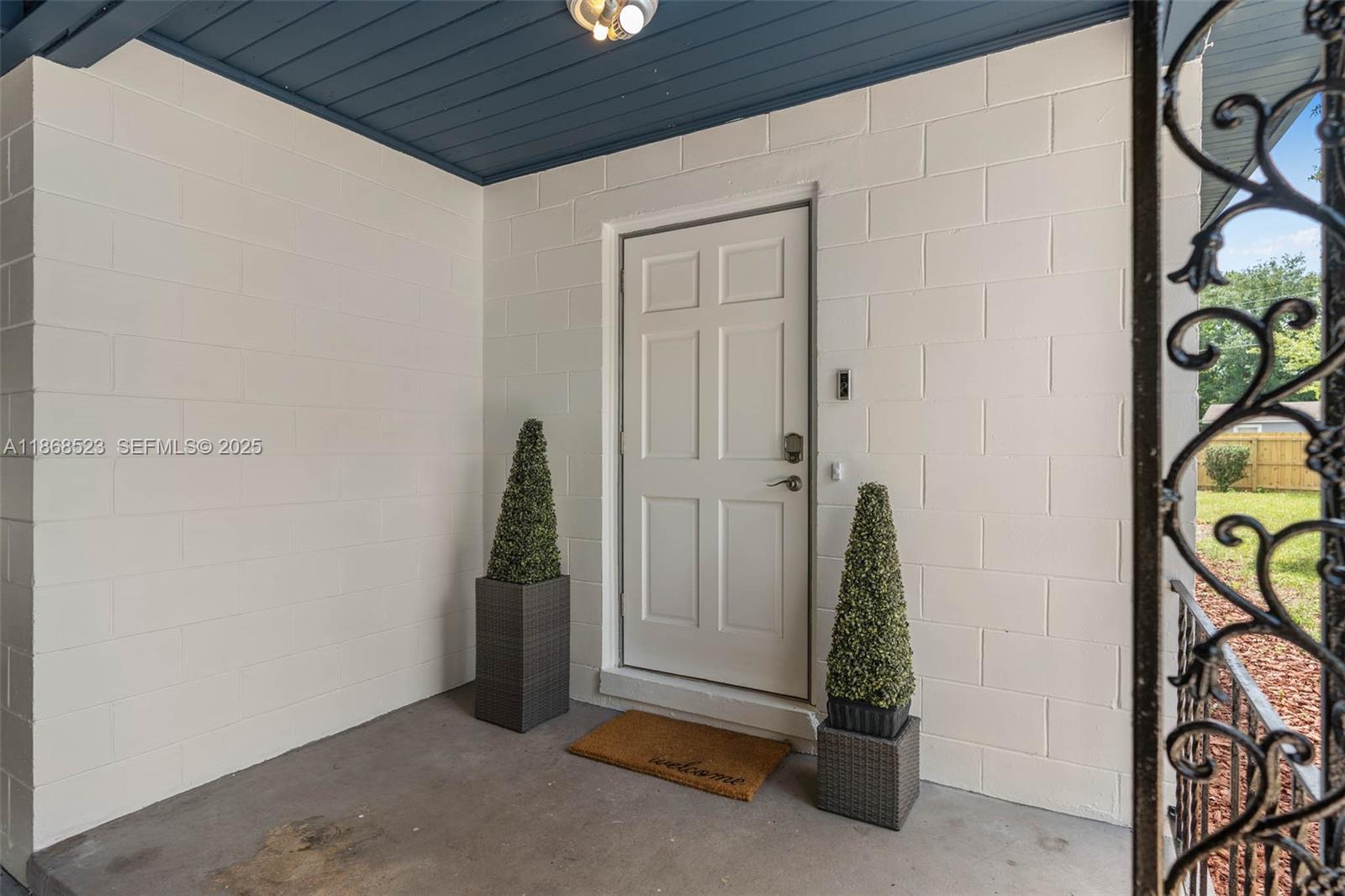 4255 Wee Street, Unit 4255 Mount Dora, FL 32757 - Photo 29 of 46 a view of an entryway with wooden floor