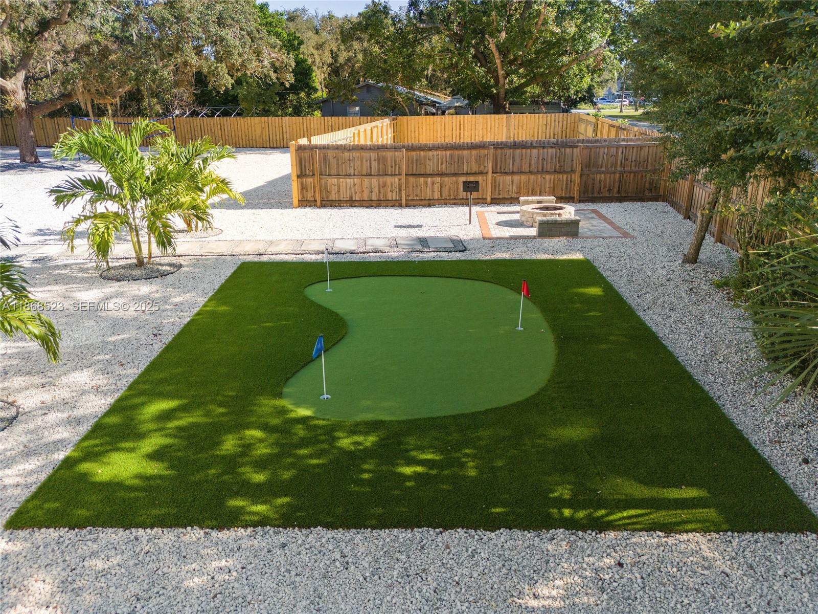 4255 Wee Street, Unit 4255 Mount Dora, FL 32757 - Photo 34 of 46 a view of backyard with swimming pool and patio
