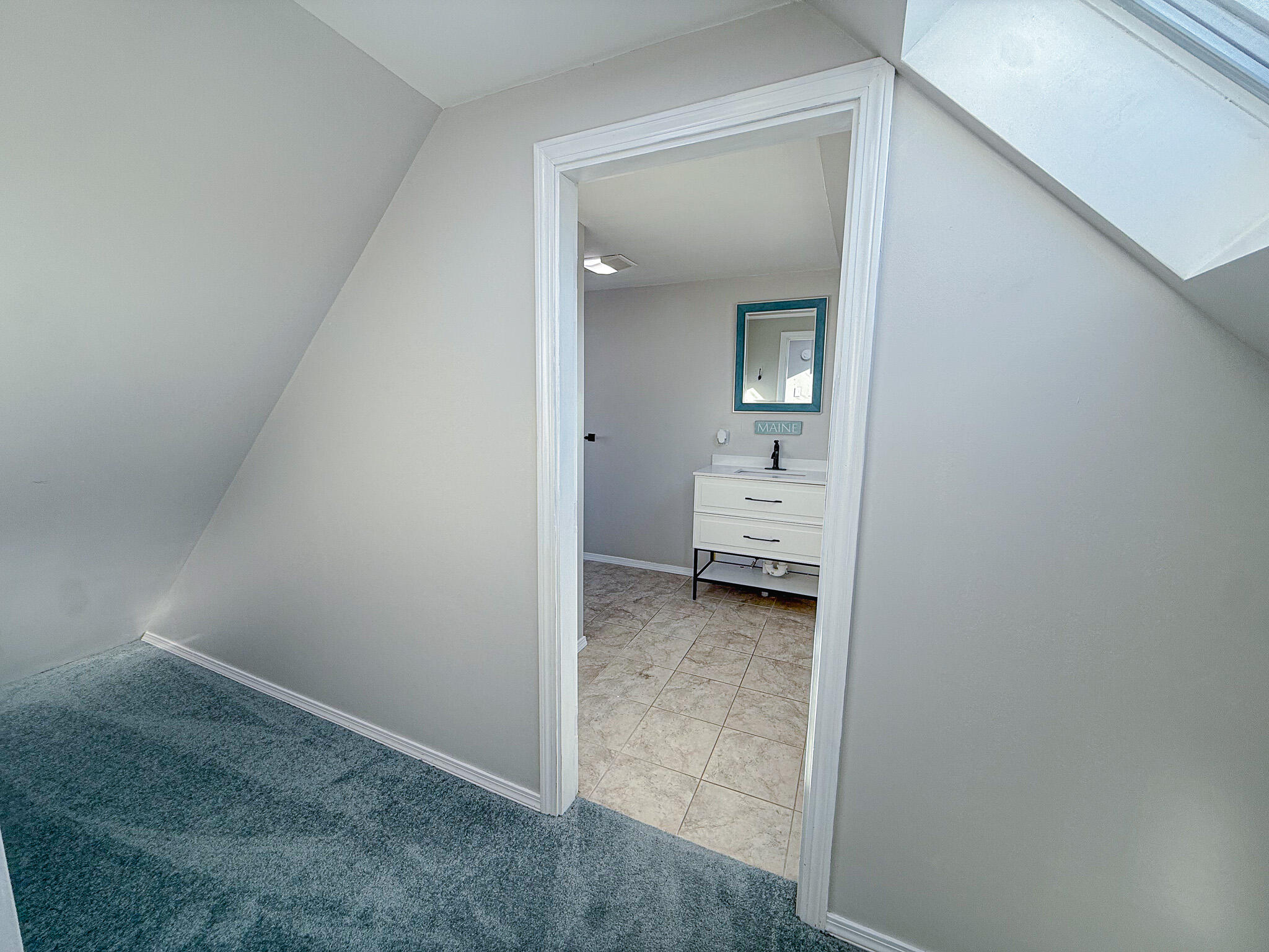 158 Wyman Road Milbridge, ME 04658 - Photo 30 of 39 Upstairs bedroom looking into bathroom