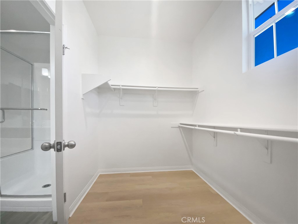 12420 Tesoro Court Grand Terrace, CA 92313 - Photo 36 of 43 a view of an empty walk in closet