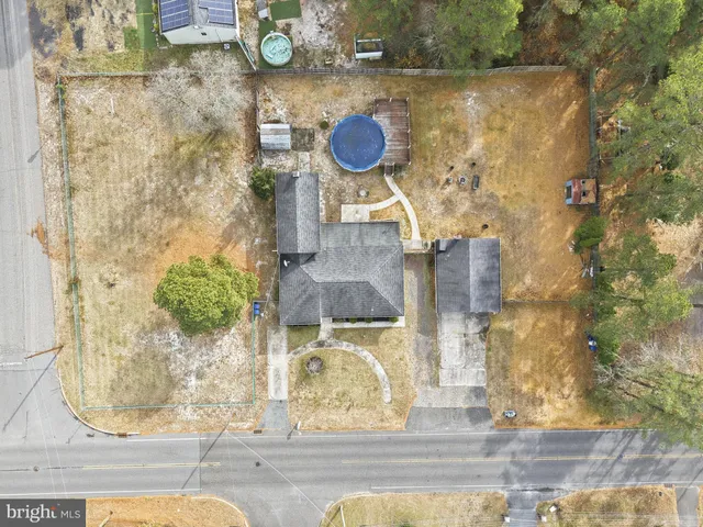 a bathroom with a granite countertop shower