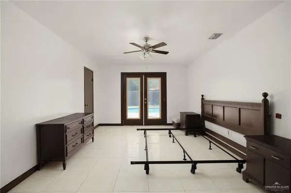 a room with gym equipment and a window