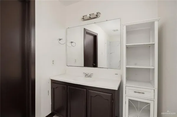 a sink with a mirror