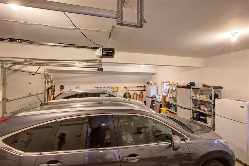 64 Walpole Meeting House Road Walpole, ME 04573 - Photo 25 of 35 Garage with workshop area at far end.