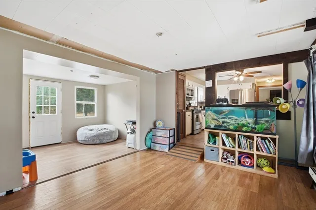 a living room with furniture and a table