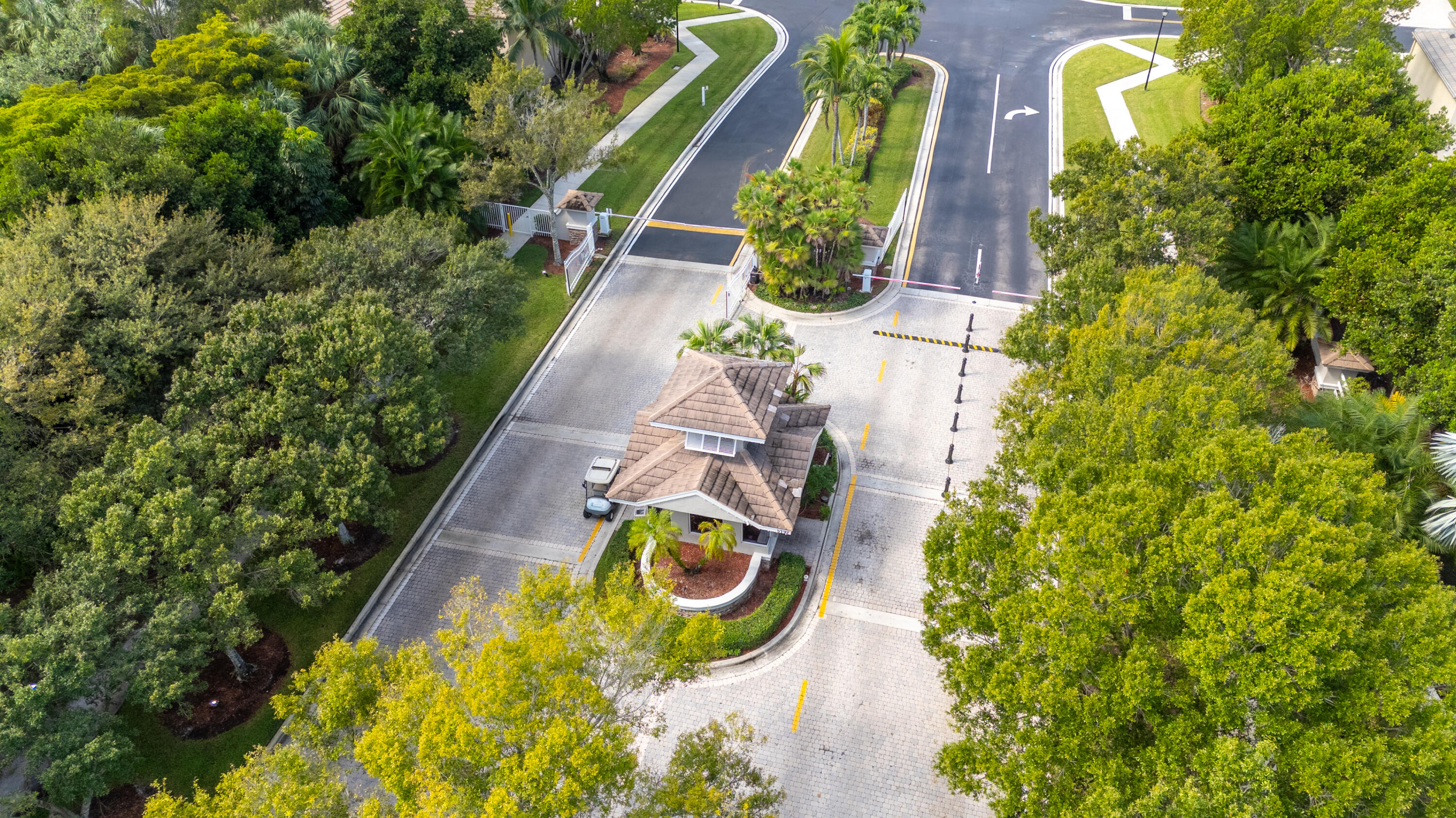 5791 Raceway Road Lake Worth, FL 33449 - Photo 54 of 62 an aerial view of a house with swimming pool and garden space