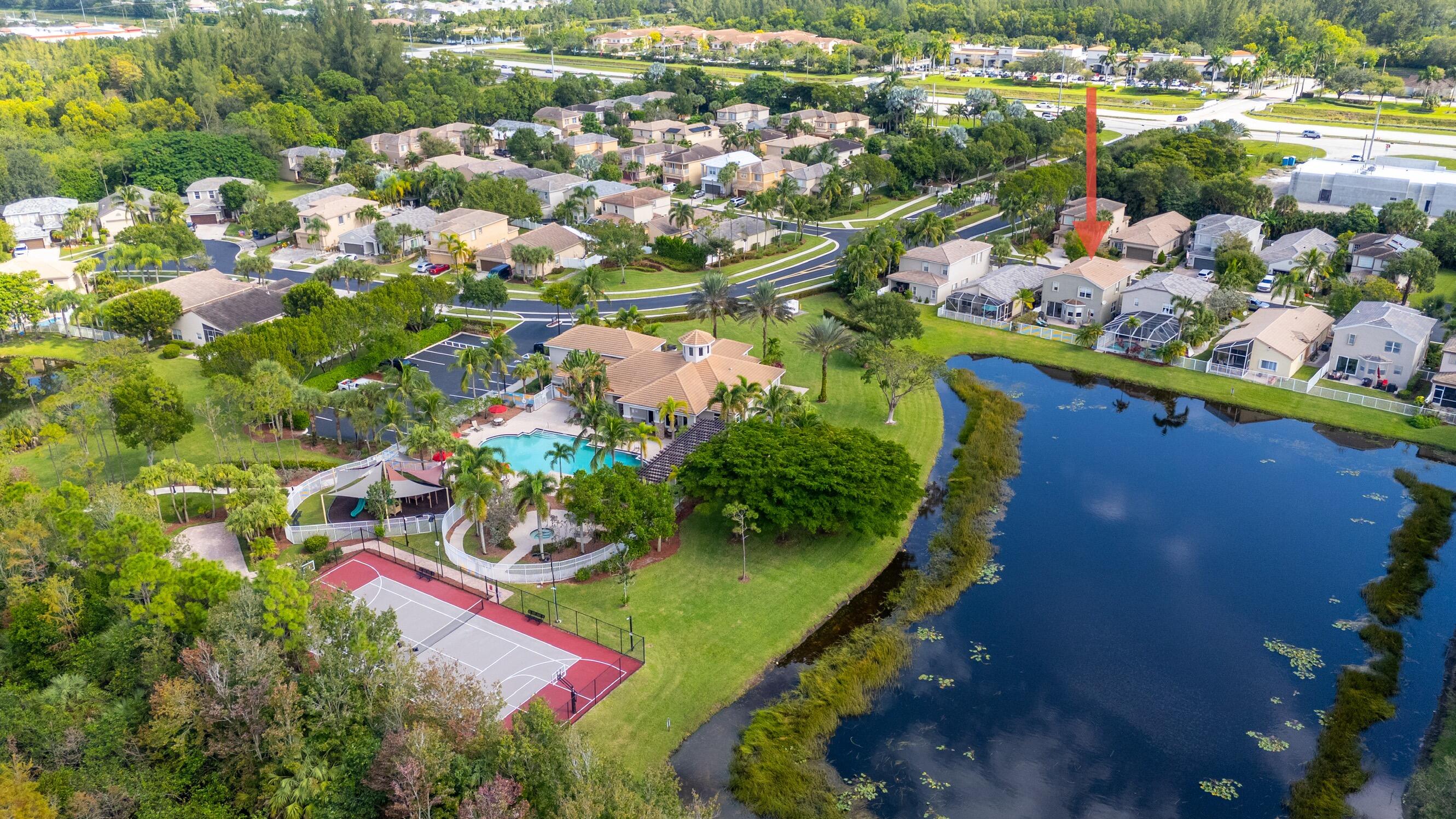 5791 Raceway Road Lake Worth, FL 33449 - Photo 58 of 62 an aerial view of residential houses with outdoor space and street view