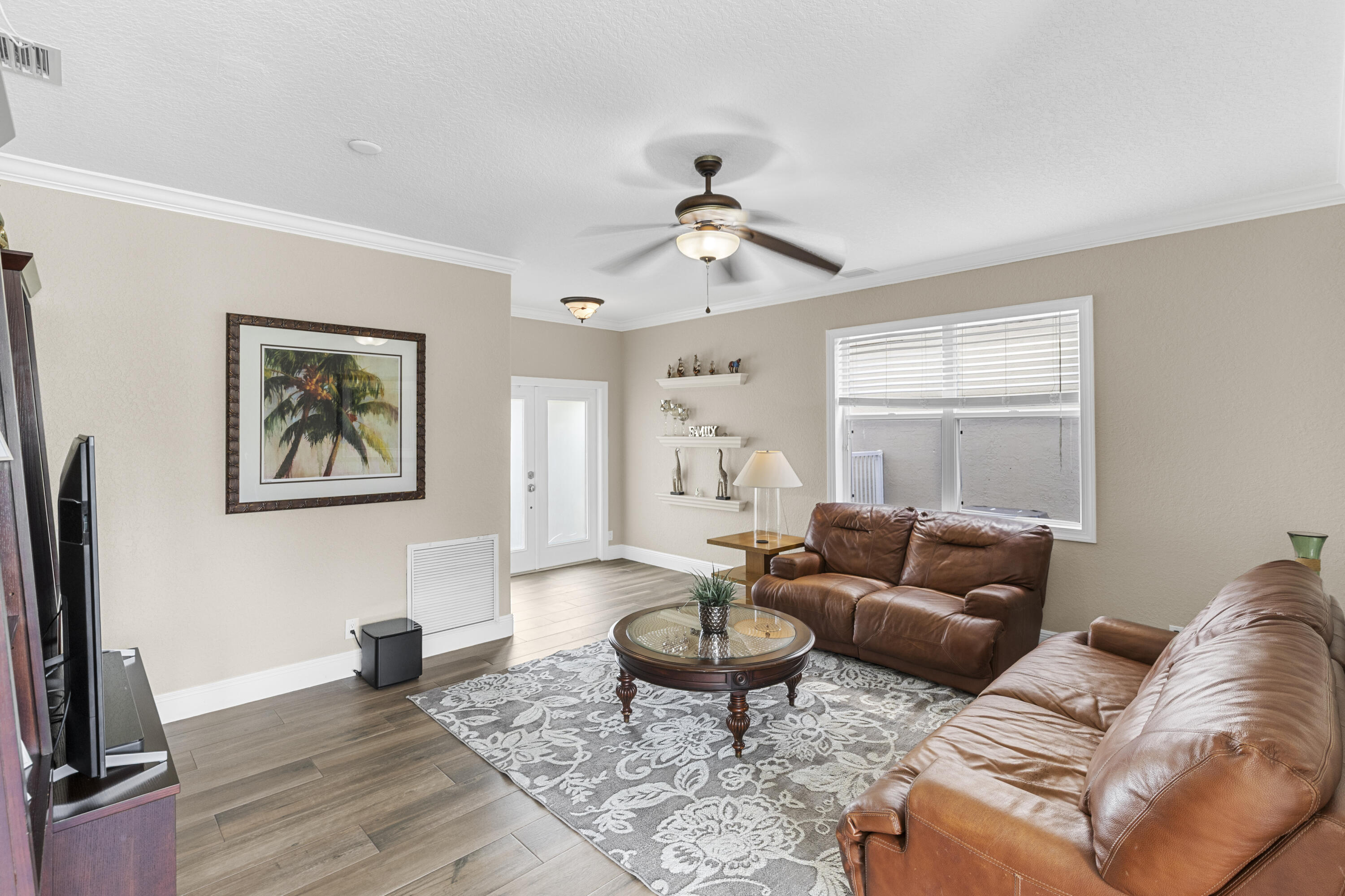 5791 Raceway Road Lake Worth, FL 33449 - Photo 7 of 62 a living room with furniture and a flat screen tv