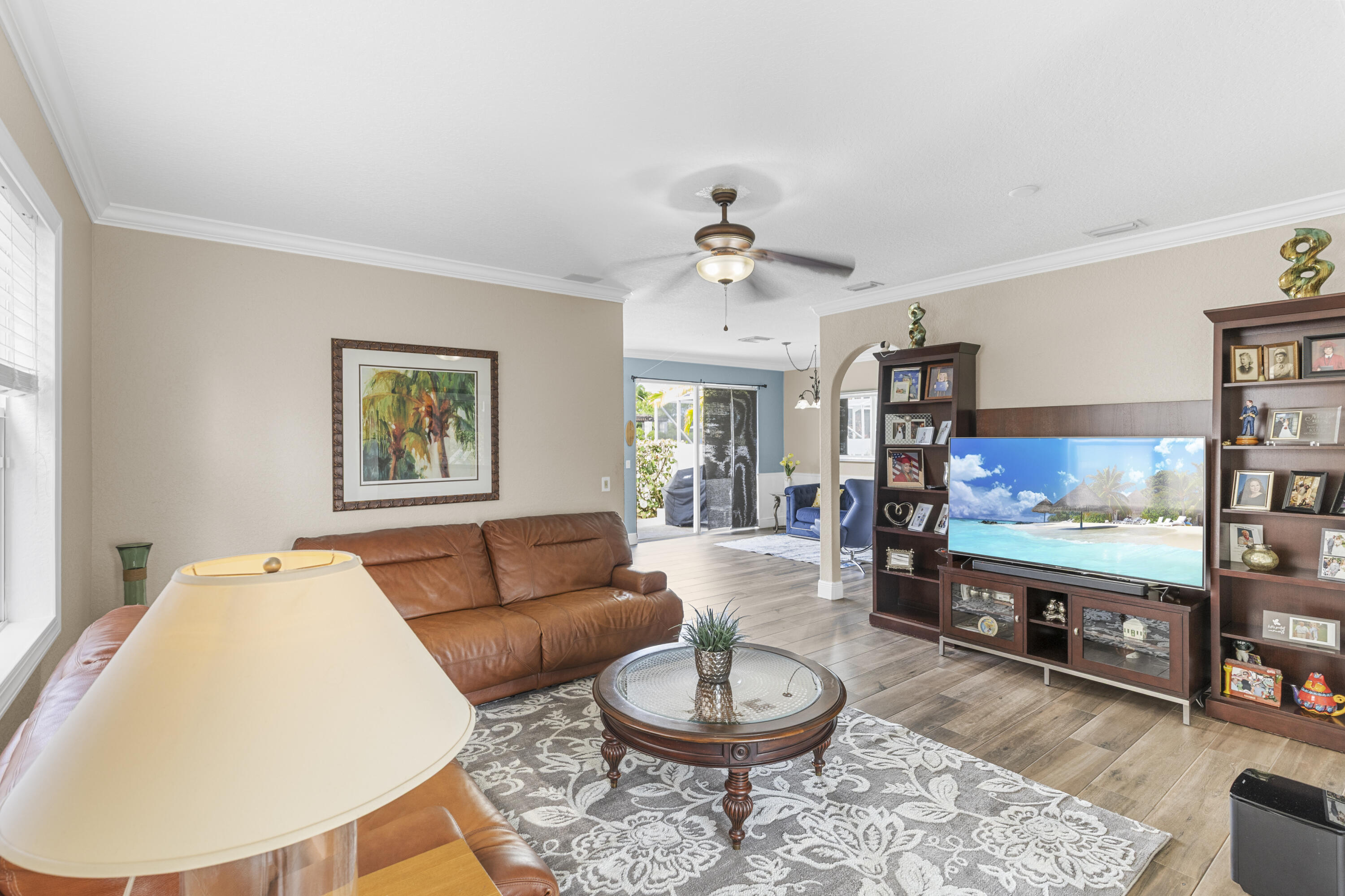 5791 Raceway Road Lake Worth, FL 33449 - Photo 8 of 62 a living room with furniture and a flat screen tv
