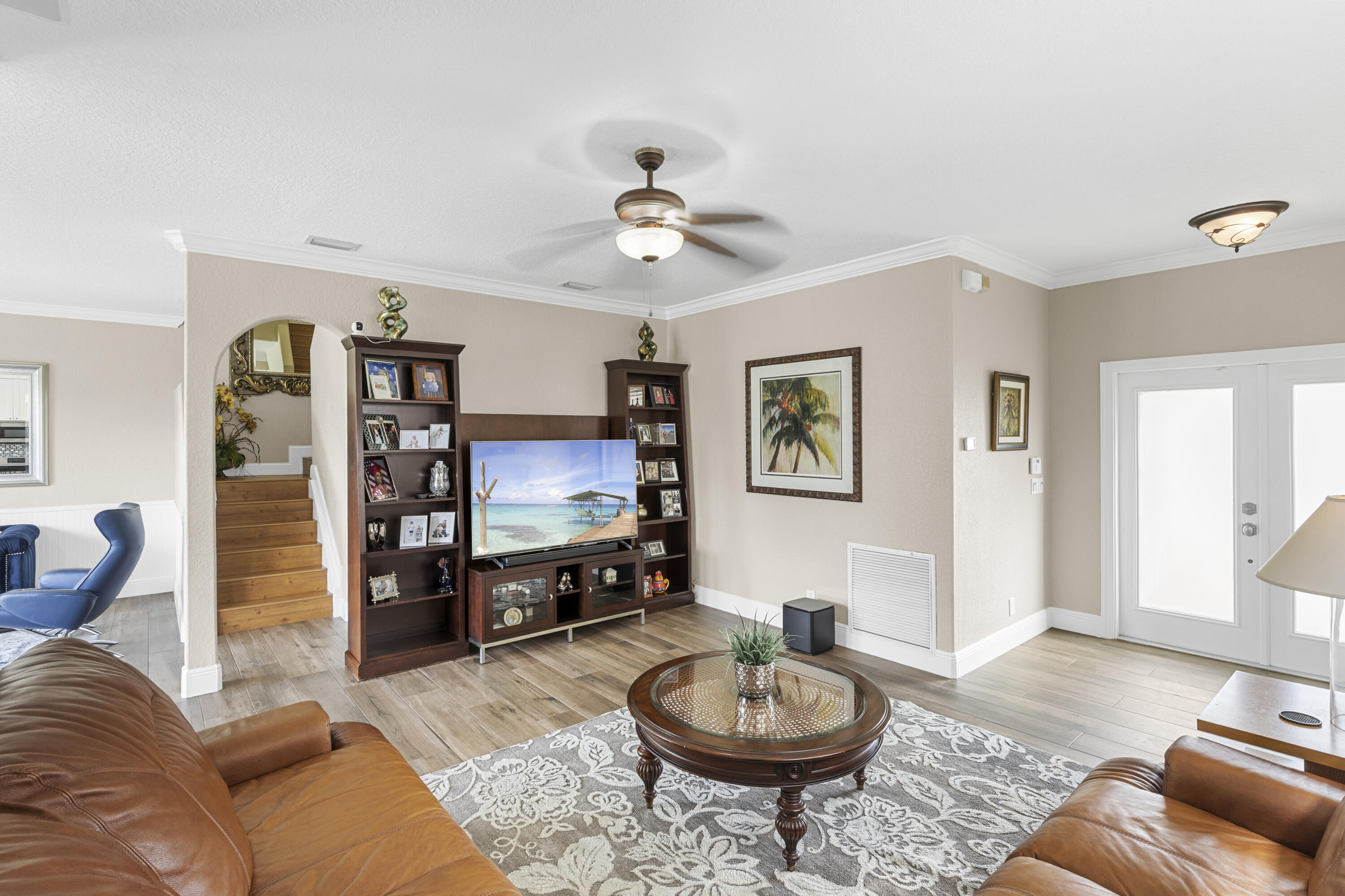 5791 Raceway Road Lake Worth, FL 33449 - Photo 9 of 62 a living room with furniture and a flat screen tv