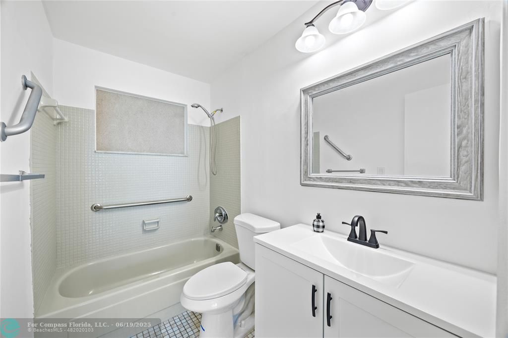 2920 Northwest 2nd Avenue Pompano Beach, FL 33064 - Photo 14 of 34 Refreshed bathroom
