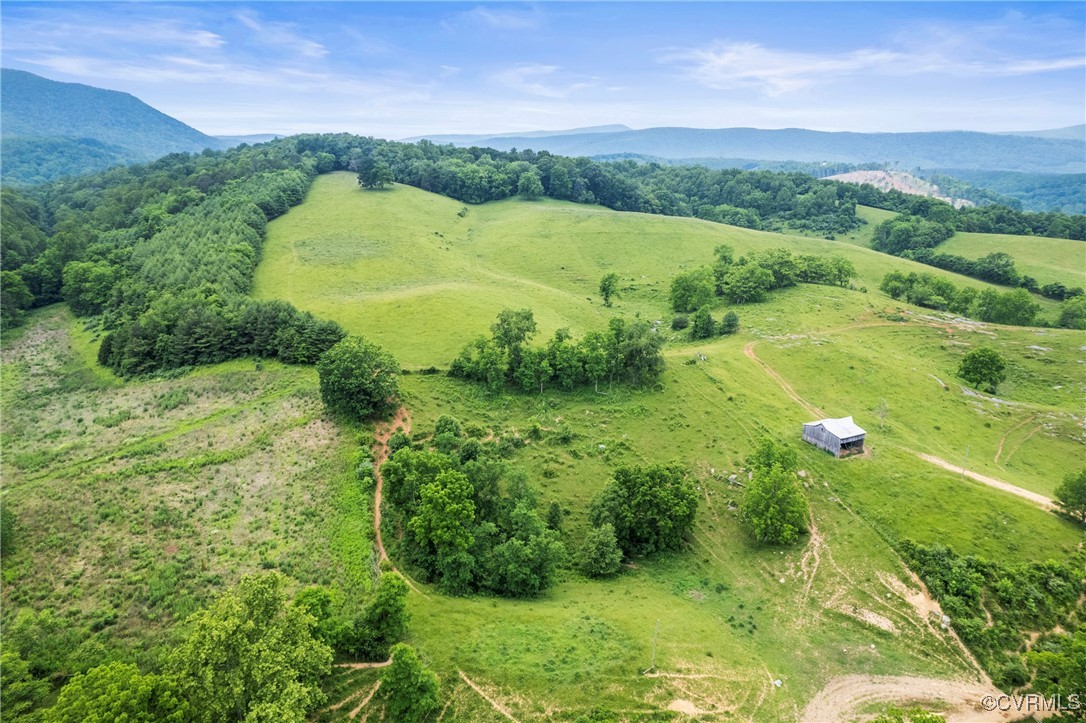 504 Springbranch Road Lexington, VA 24450 - Photo 13 of 50 a view of a lush green outdoor space with a lake view