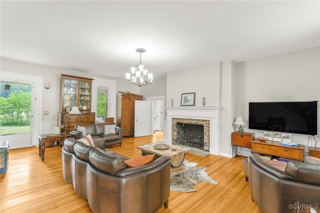 504 Springbranch Road Lexington, VA 24450 - Photo 18 of 50 a living room with furniture flat screen tv and a fireplace